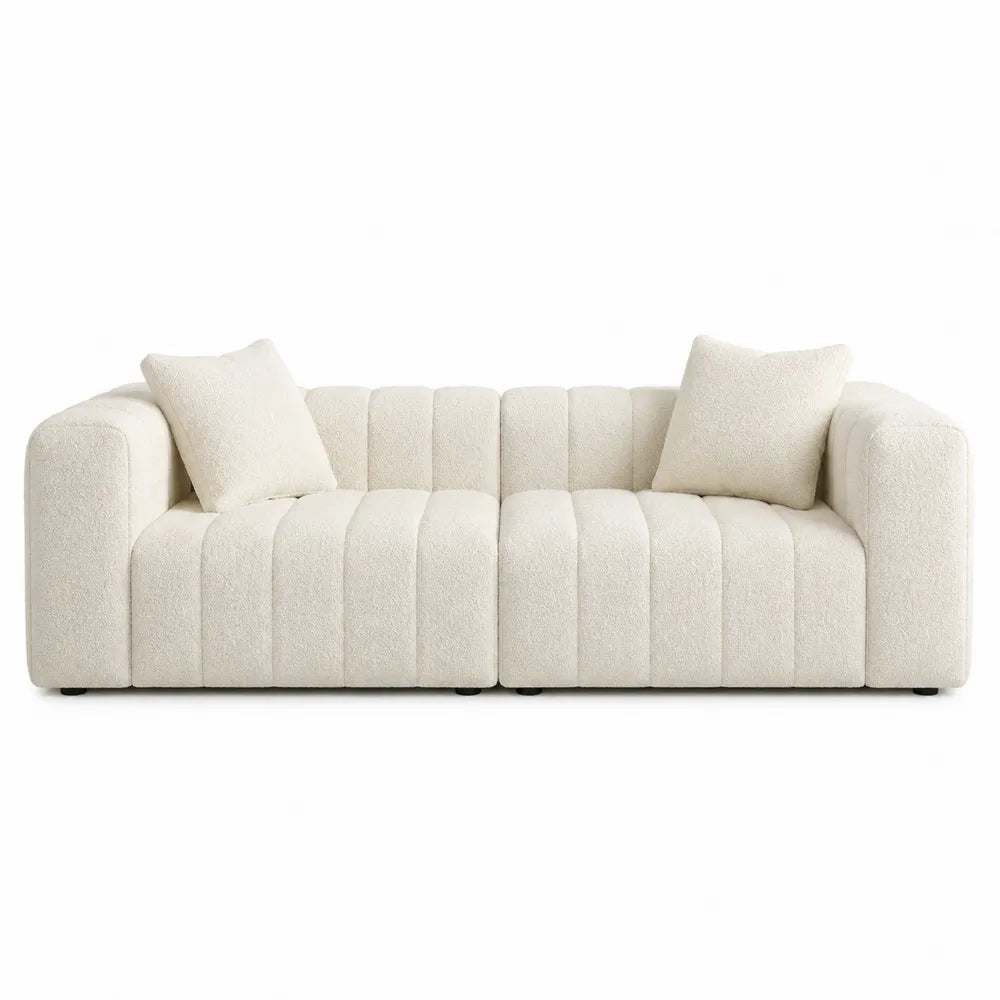Canapé modulaire en tissu bouclette polyester beige avec coussins